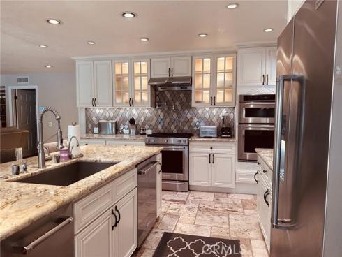 7702  E. Live Oak  , Orange, CA