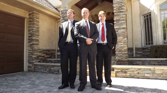 Jansen Team in front of house sold by Jansen Team
